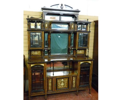 A superb quality rosewood and ivory inlaid display cabinet, the multi-mirrored super structure with broken pediment and carve