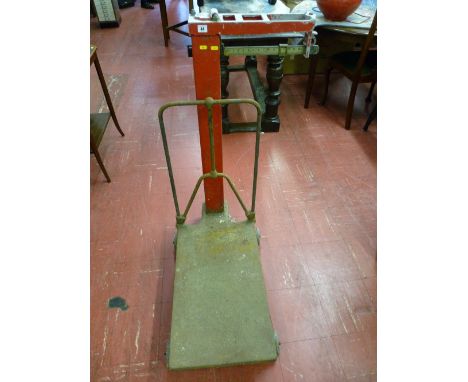 A set of aluminium and cast iron station scales, 112 cms high