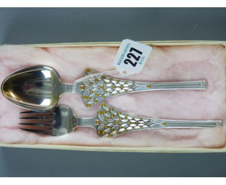 A Danish silver fork and spoon pair, each piece with amber decoration, each piece marked A Michelsen with maker's initials 'T