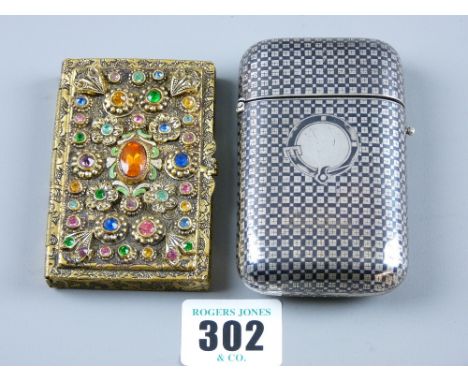 A shallow yellow metal lidded case, the lid encrusted with precious stones as flowers and a white metal and enamel Continenta