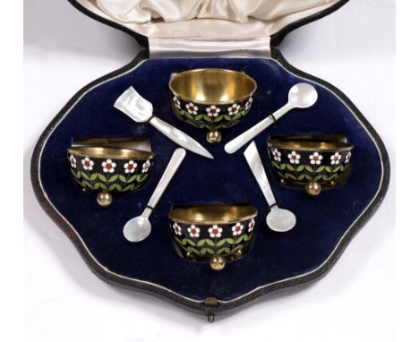 Four enamel silver salts Russian with mother of pearl spoons in a lined case