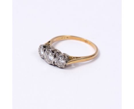 18ct gold ring with three stone diamond setting