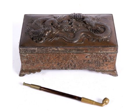 Chinese metal box late 19th Century decorated with a dragon and longlife symbols, 21cm and a small opium pipe (2)