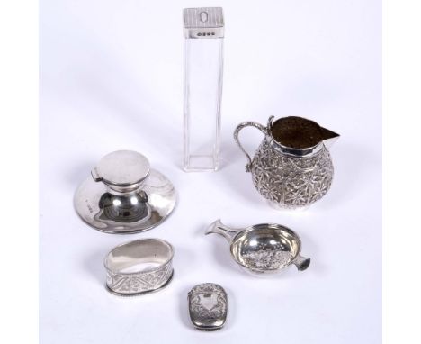 Small collection of miscellaneous silver wares including an Indian white metal jug, a silver Capstan inkwell, a silver tea st