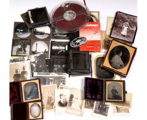 Photography to include magic lantern slides, postcards and black and white photographs, and two audio tapes, one marked Gener