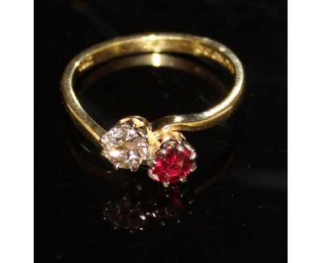 An 18 carat gold ruby and brilliant cut diamond dress ring, each stone approx 0.4 carats, approx 3.9 g total weight, size U/V