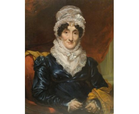 19TH CENTURY ENGLISH SCHOOL IN THE MANNER OF SIR THOMAS LAWRENCE (1769-1830) "Lady seated wearing a white bonnet and blue dre