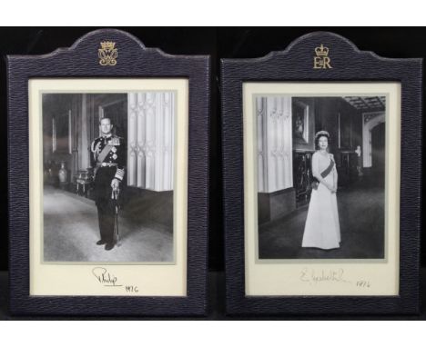 OFFICIAL PHOTOGRAPHS OF QUEEN ELIZABETH II AND PRINCE PHILIP, portrait studies, a pair, black and white full length, both sig