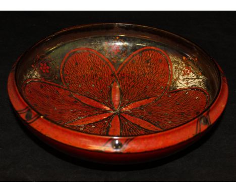 A Royal Lancastrian ruby red lustre bowl, the centre field decorated with flower head, marked to base "England 3246", 27.5 cm