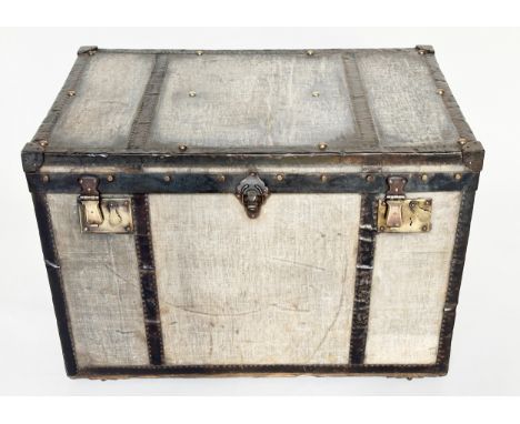 TRAVELLING TRUNK BY J BURTON AND BRO LONDON, early 20th century canvas lined and metal bound with rising lid and leather carr