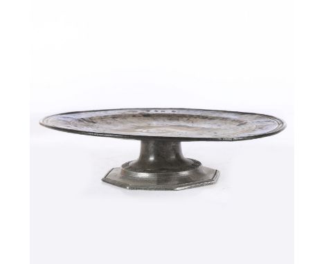 The plate with multi-reeded rim, struck with unidentified hallmarks ‘RN’ (Robert Nicholson? PS6795), on an octagonal spreadin