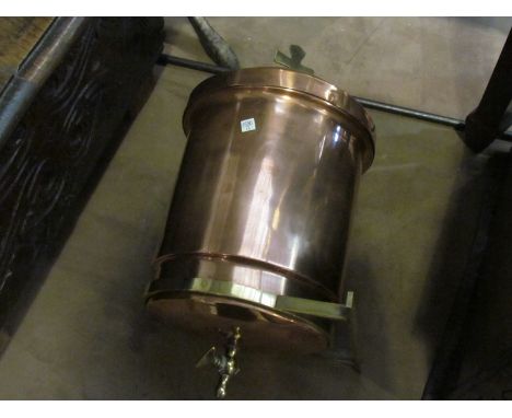 A circa 1900 copper and brass holy water font with brass bracket