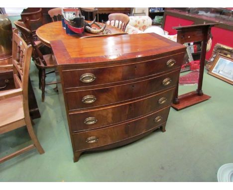 A circa 1840 crossbanded mahogany bow front chest of four graduating long drawers on outswept bracket feet, 85.5cm high x 90c