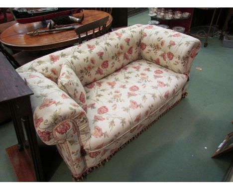 A Victorian two seater button back drop arm Chesterfield sofa on bun feet and castors (with scatter cushion) 155cm wide