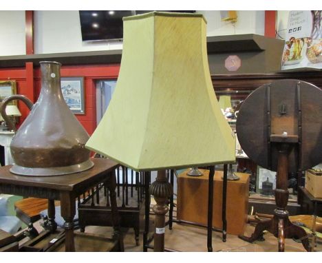 A Victorian style mahogany standard lamp with shade