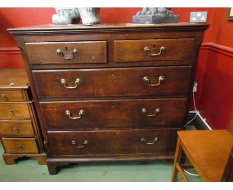 An 18th Century oak chest of two short over three graduating long drawers with brass swan neck handles over bracket feet, 110