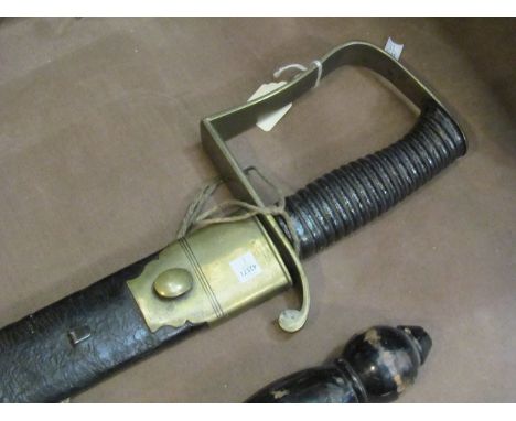 An early to mid 19th Century officer's hanger with single fullered blade, brass stirrup-form hilt and cast metal ribbed grip.