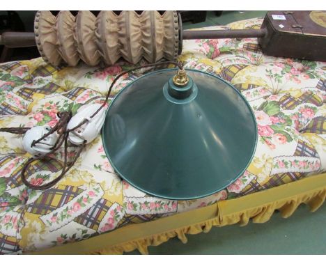 A 1970's industrial light shade on a rise and fall chain