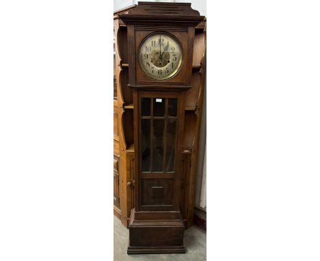 An early 20th Century oak longcase clock 