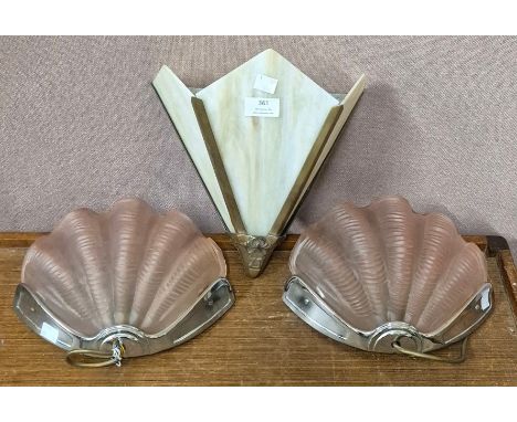 A pair of Art Deco chrome and pink glass wall light, one other and a table lamp