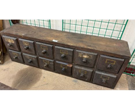 A Victorian pine twelve drawer apothecary cabinet and a Nelsein fitted engineers chest with tools 