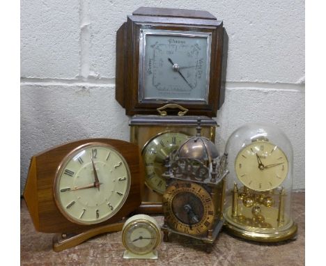 Five clocks; Smiths 8-day brass lantern style, Smiths Empire, Metamec X2 and Kundo Anniversary plus an aneroid barometer, Mad