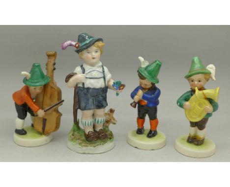Three Goebel bandsman figures, all a/f and one other German figure (4)