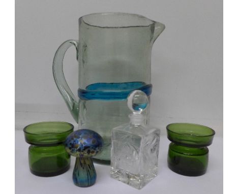 A 19th Century blue glass pitcher, two green Dansk Designs candle holders, an Isle of Wight mushroom paperweight and a Royal 