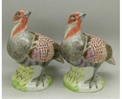 A matched pair of French c.1900 ceramic model partridges, some a/f, 15.5cm