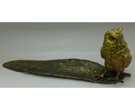 A cold painted inkwell in the form of an owl, marked Geschutzt