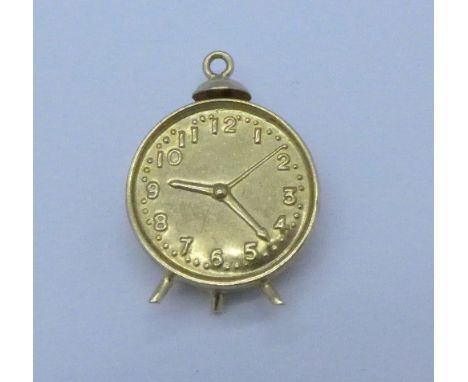 A 9ct gold alarm clock charm, 1.5g
