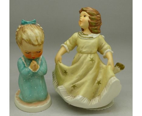 A Goebel figure, A Child's Prayer and a Goebel angel musical figure playing White Christmas