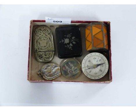 Small box containing a number of mainly vesters, also small compass and athletics medal