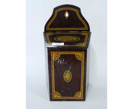 Vintage biscuit tin with a shell and other motifs