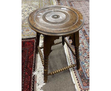 Small late 19th or early 20th Century oak occasional table raised on a bobbin turned frame bearing table to underside for Dru