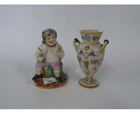 Staffordshire figure of a Vintner or Jolly Toby on shaped base, 17cm high together with a vase in Italian Mailoica decorated 