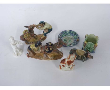 Quantity of English porcelain wares including a ceramic pig with agate style glazes, pair of Beswick figures and man pulling 