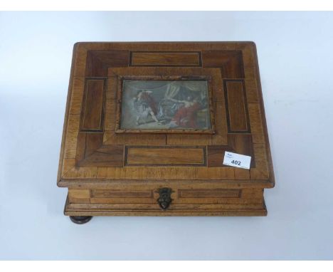 Late 19th Century stationery box, the centre with  panel of a classical scene surrounded by inlaid various woods