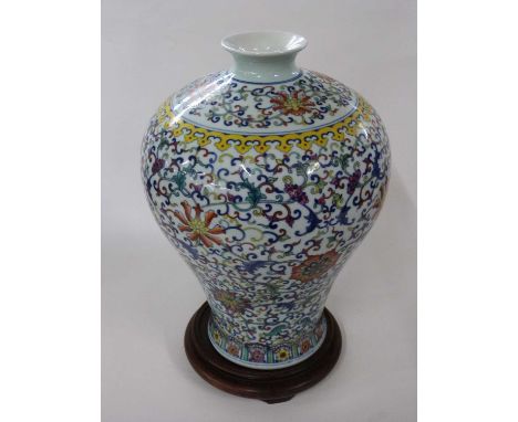 Large Chinese porcelain Meiping vase, the baluster body with a polychrome scrolling design beneath yellow lappits, the neck w