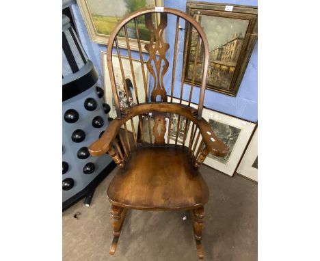 Good quality 20th Century oak rocking chair with arched stick back, 118cm high