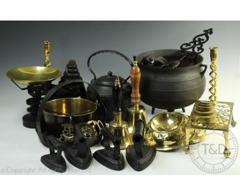 A large collection of 19th century and later brass, pewter and cast iron wares, to include; a goffering iron, teapots and cov