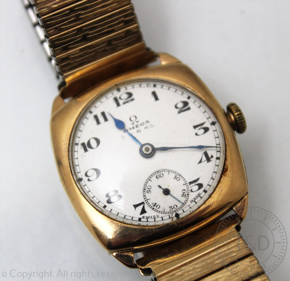 A 9ct gold Omega wristwatch Birmingham 1930, the cushion shaped case