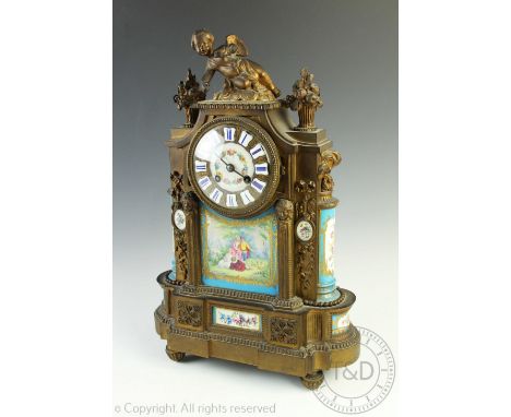 A 19th century French 'Leroy a Paris' ormolu eight day mantel clock, enamel Roman numeral dial with movement striking on a be