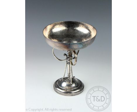 A silver golfing trophy R F Mosley and Co, Sheffield 1938, the bowl raised on delicate central column supported by three golf