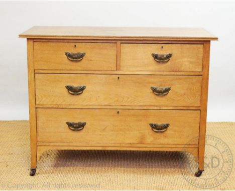 An Edwardian ash chest with two long and two short drawers, each with Secessionist style handles, 81cm H x 107cm W x 48cm D  