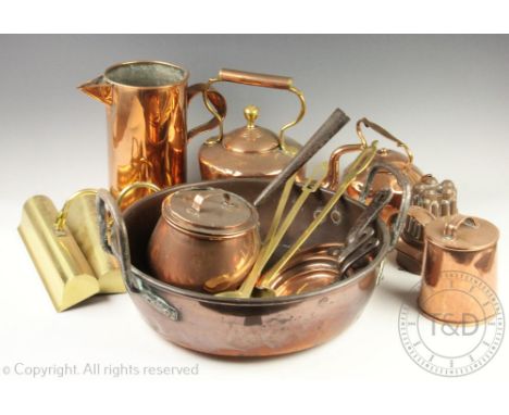 A large quantity of assorted copper, brass and light fittings, to include; a large preserve pan, a jelly mould, a kettle, pan