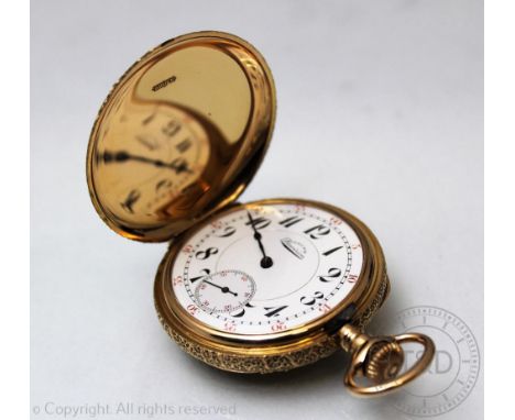 An American 'Gruen Precision' 14K full hunter pocket watch, early 20th century, the case finely cast with borders of scrollin