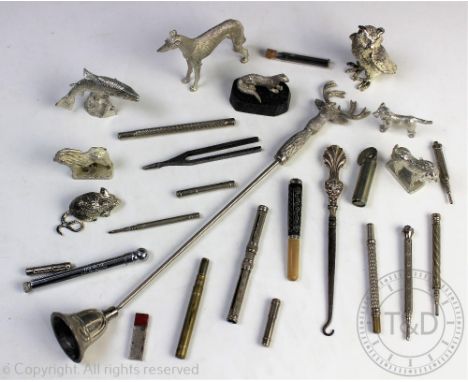 A collection of silver plated and white metal items to include a stag head handled candle snuffer, 34cm long, a pique worked 