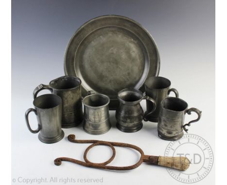 A collection of 19th pewter tankards including a pair of Imperial pint examples, each engraved to the underside, 14cm high, a