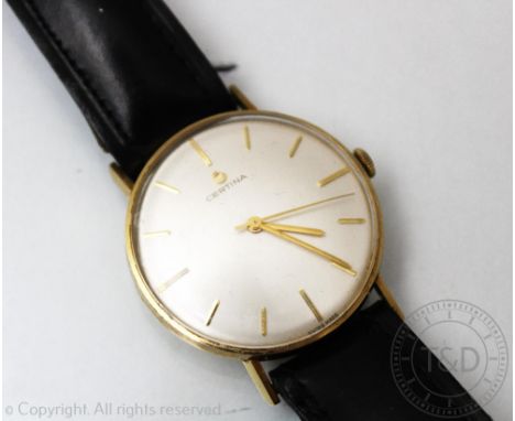 A Certina Swiss 9ct gold wristwatch circa 1965, the circular case enclosing champagne dial with gilt batons, gilt hands and c
